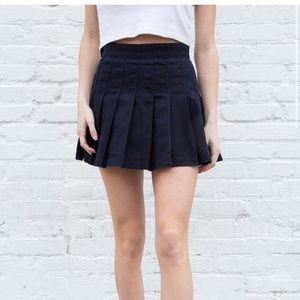 One size brandy melville navy blue pleated skirt!